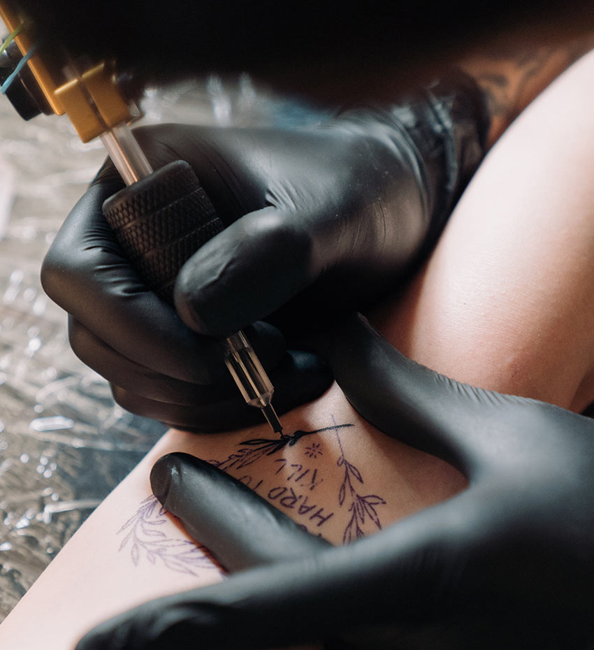 Tattoo Artist at Work Tattoo Artist at Work